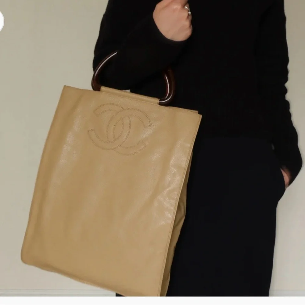 Authentic CHANEL beige caviar leather CC tortoise top handle satchel bag